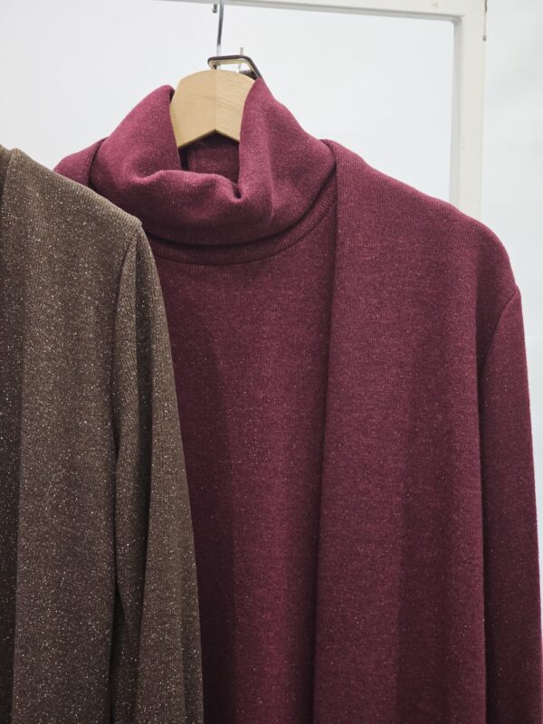 Abito smanicato con spolverino