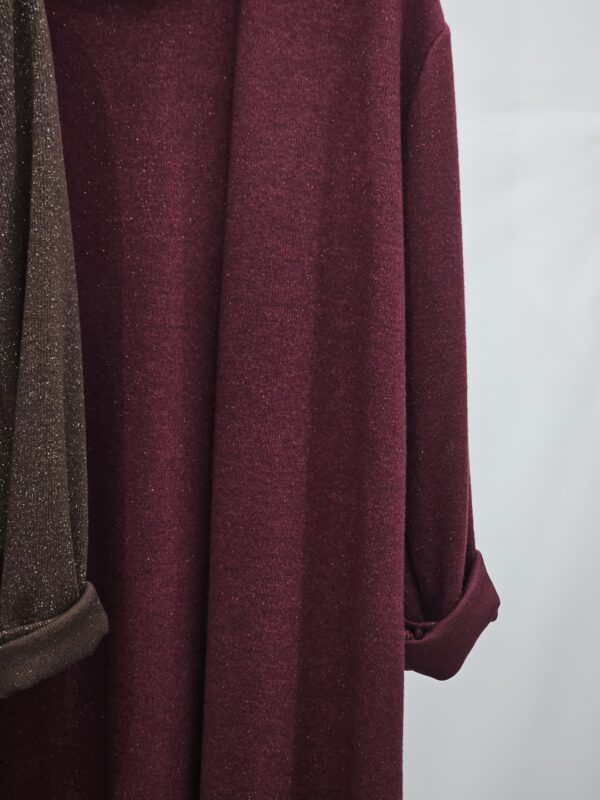 Abito smanicato con spolverino