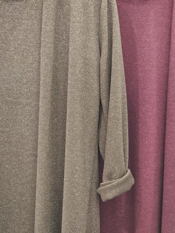 Abito smanicato con spolverino