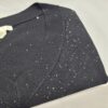 Maglia collo V con paillettes